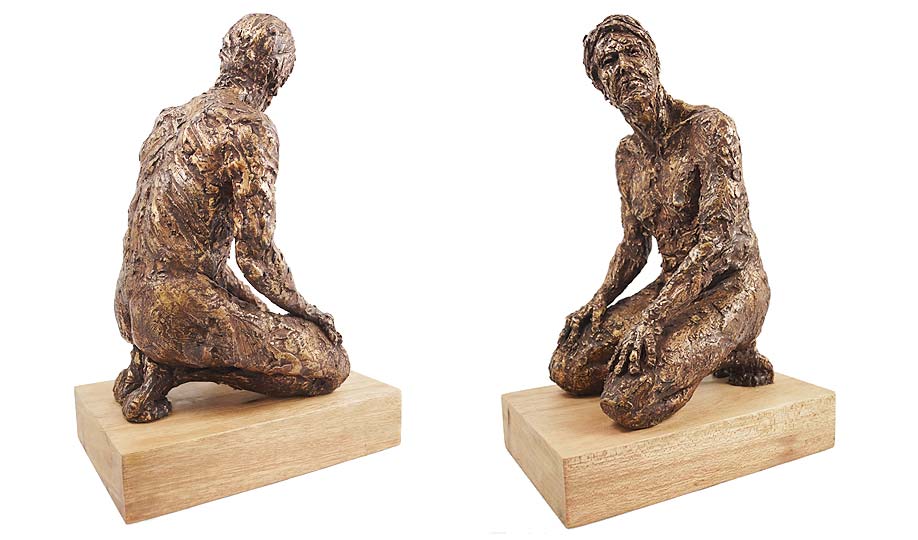 Figure of Kit&nbsp;kneeling