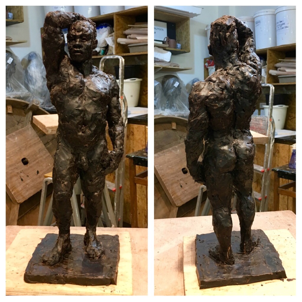 Sculpting a standing figure of Matthew in&nbsp;wax